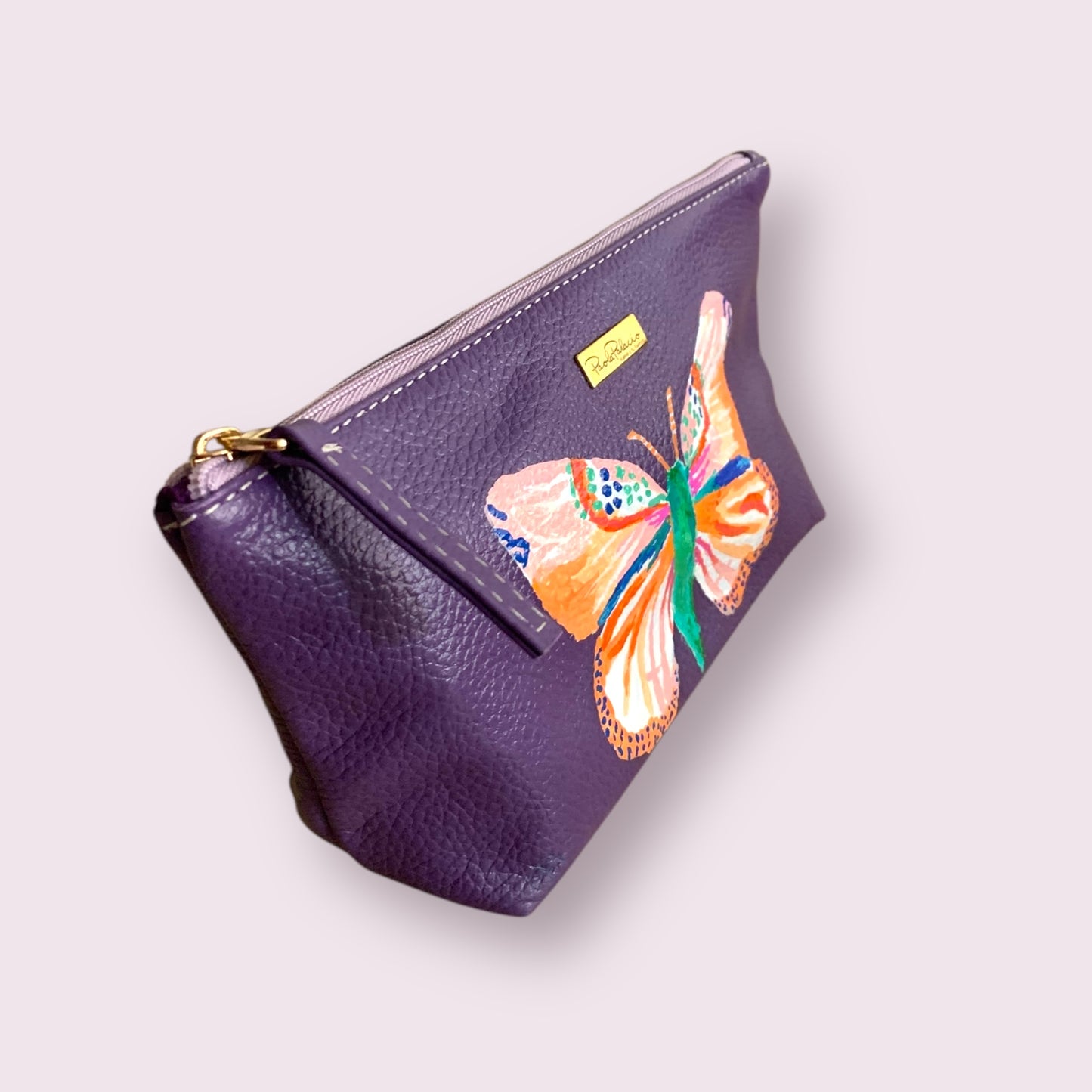 Cosmetiquera cuero morado. Pintada a mano - Pieza única.