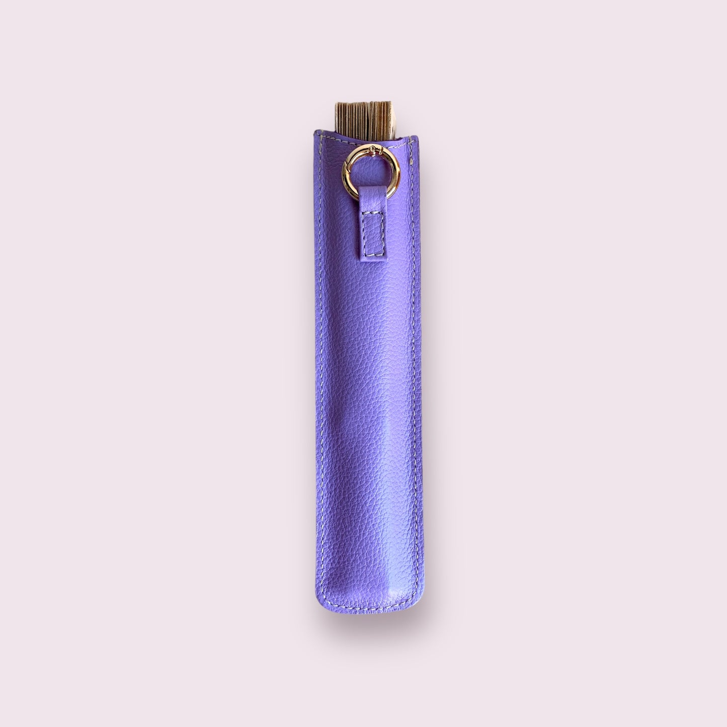 Abanico con estuche en cuero lila
