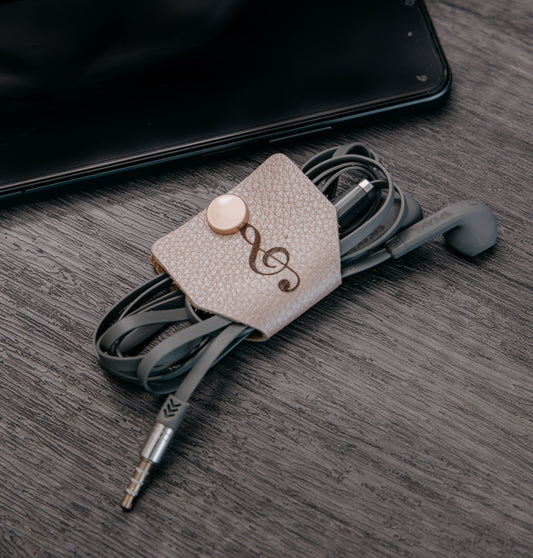 Ata cables maleta cuero beige con nota musical